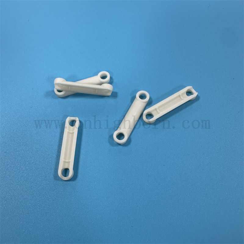 Benutzerdefinierte Verarbeitung CNC -Verarbeitung 99%Aluminiumoxid Keramik Snap Ceramic -geformtes Teile