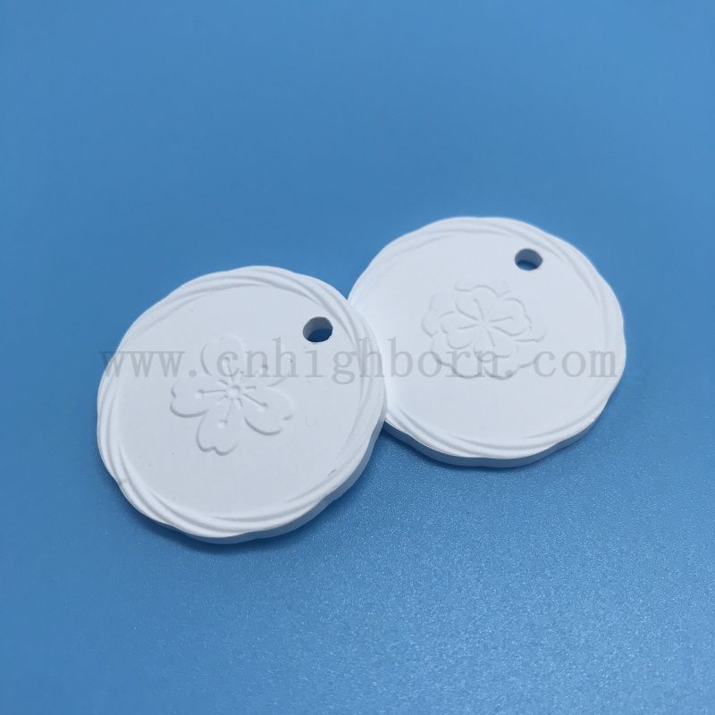 Doppelseitiger Logo-Ton, poröse Keramik-Duftstein-Aromadiffusor-Hängeplatte